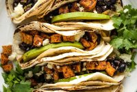 Sweet Potato and Black Bean Tacos with Avocado Lime Crema