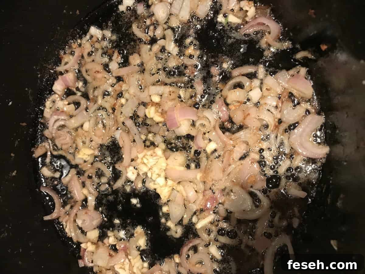 sauteing shallots and garlic for cream sauce used on pan seared salmon