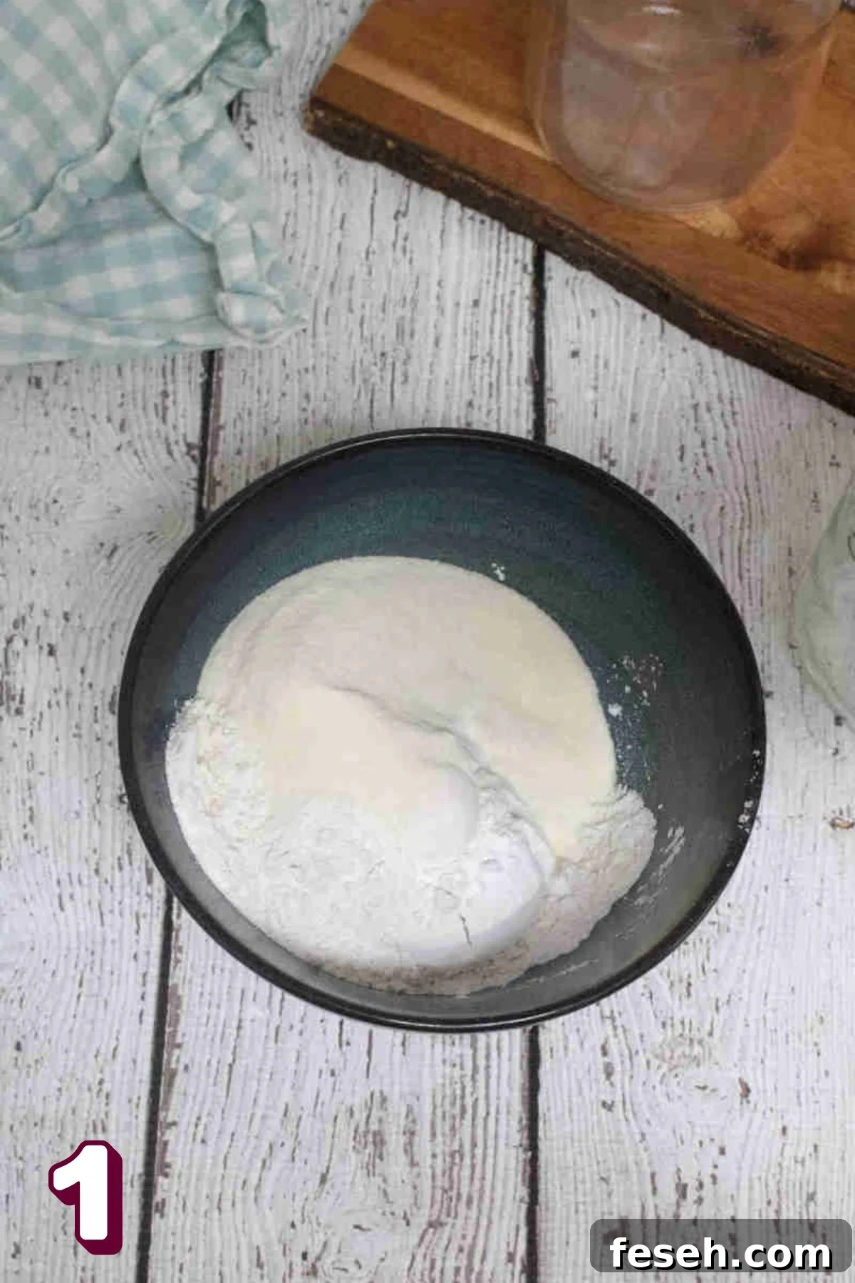Dry ingredients in a blue mixing bowl.