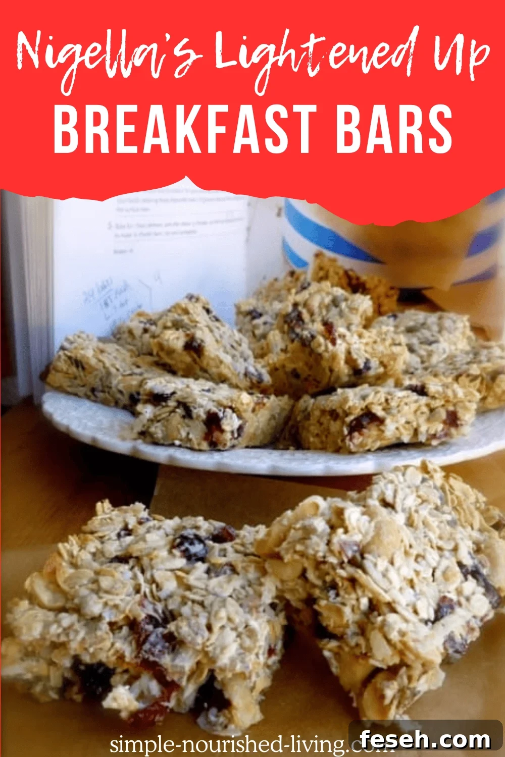 Breakfast Bars on white serving plate with cookbook in the background.