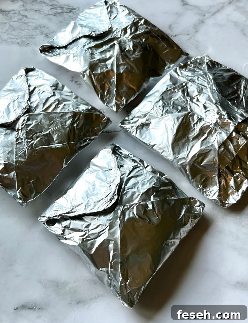 Sealed foil packets ready for the grill