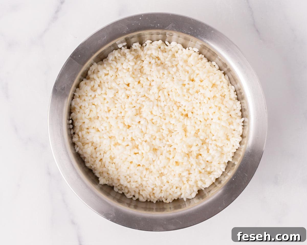 Draining the short grain glutinous rice.