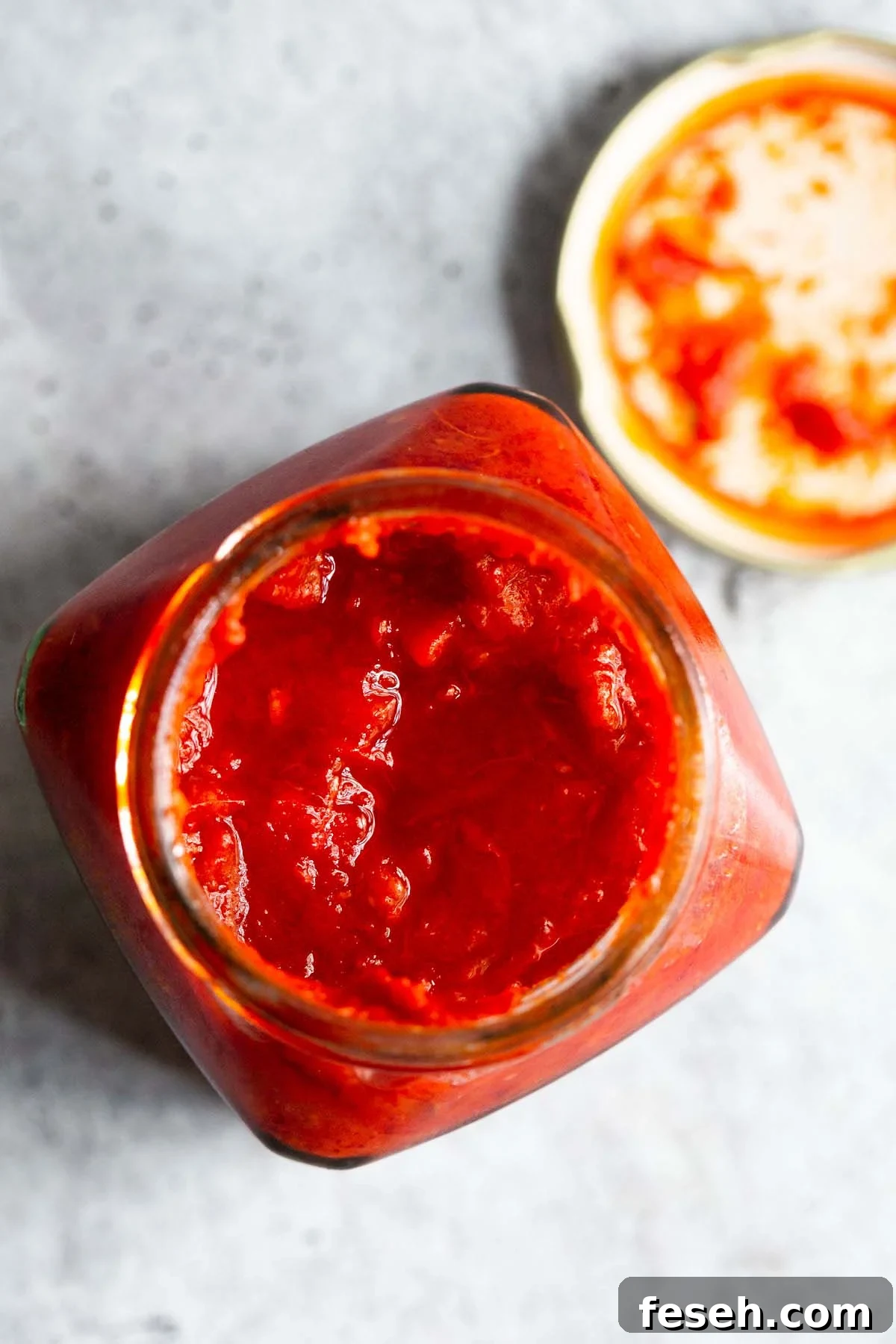 Opened jar of harissa.