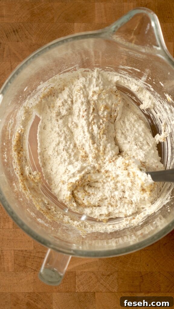 gently fold the walnuts into the egg whites