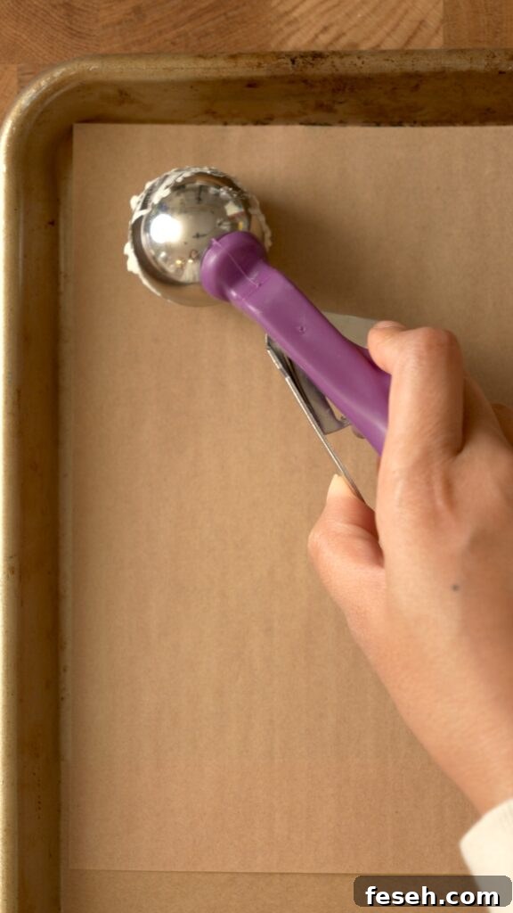 portioning and placing the merengues on a baking pan