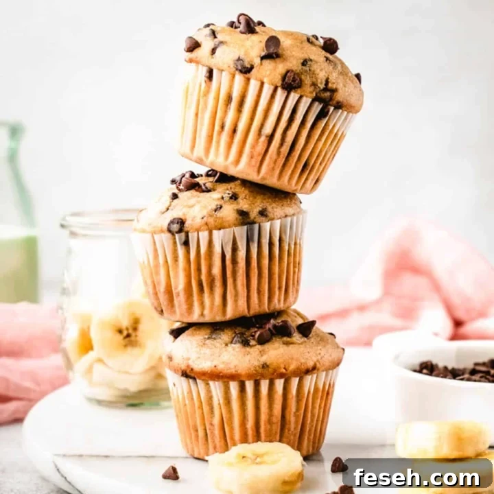 Stacked banana muffins with chocolate chips.