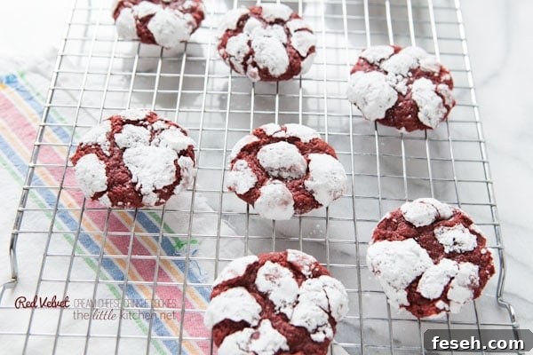 Red Velvet Cream Cheese Crinkle Cookies from thelittlekitchen.net