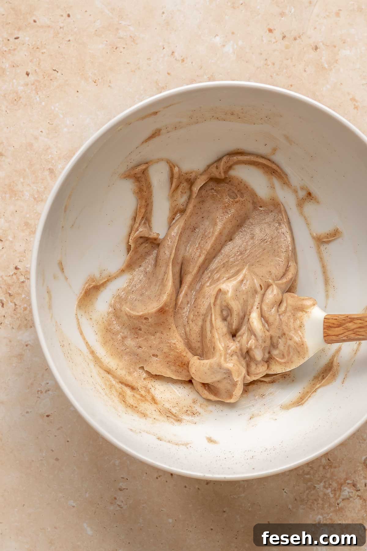 Honey cinnamon butter mixed in a bowl.
