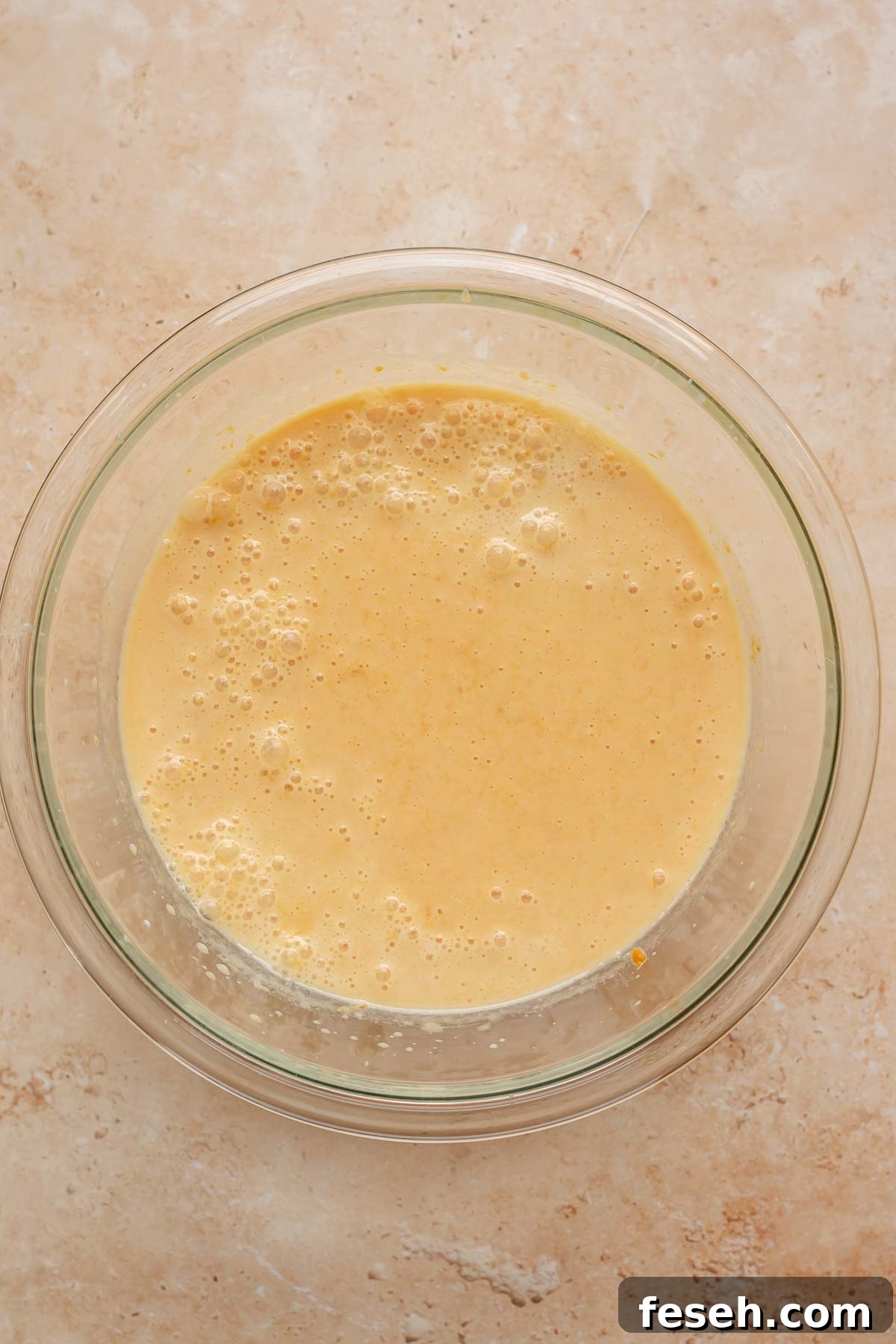 Sweet potato batter in a bowl.