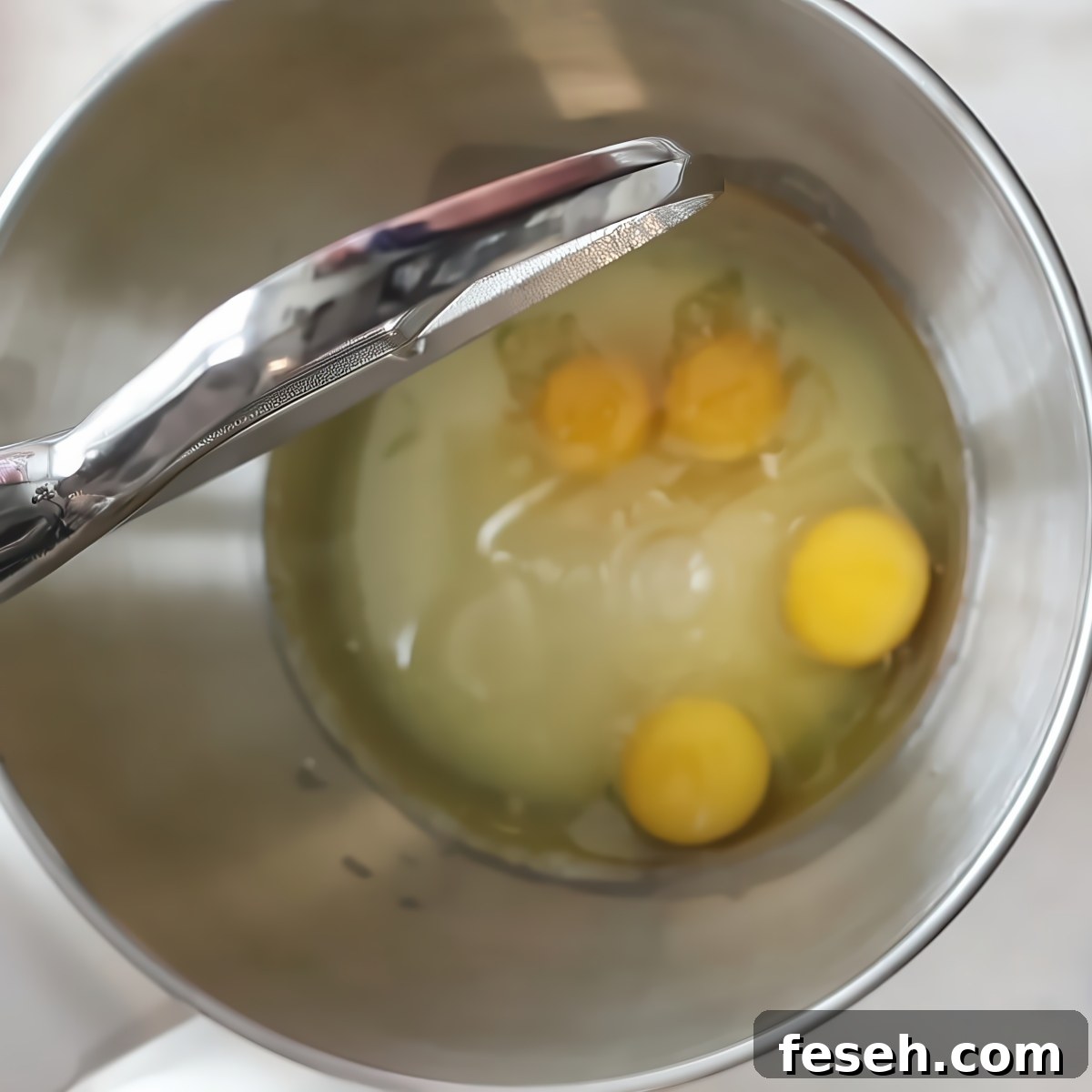 eggs, sugar, and oil in bowl of stand mixer.