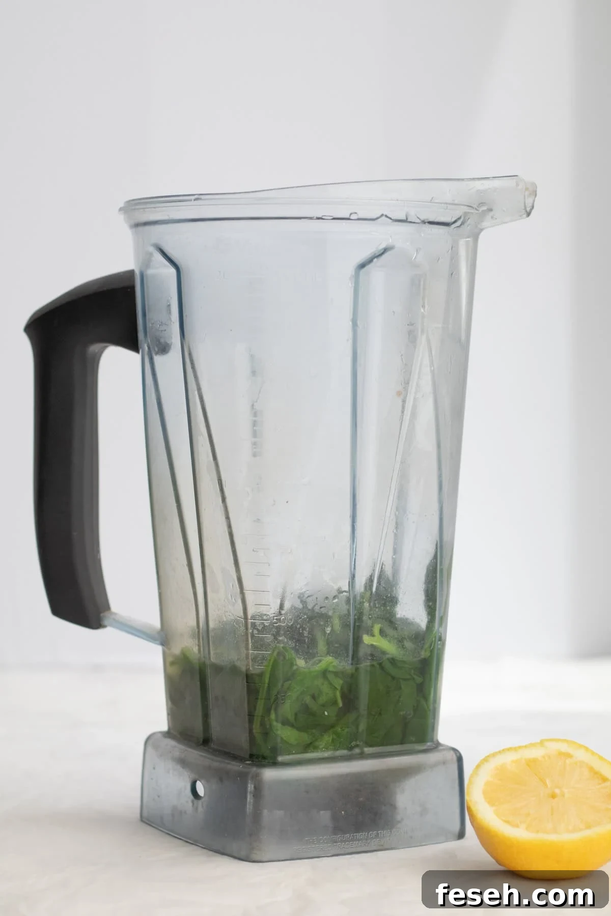 10-Minute Spinach Purée for Babies: Smooth, Nutritious Baby Food 5 cooked spinach in a blender