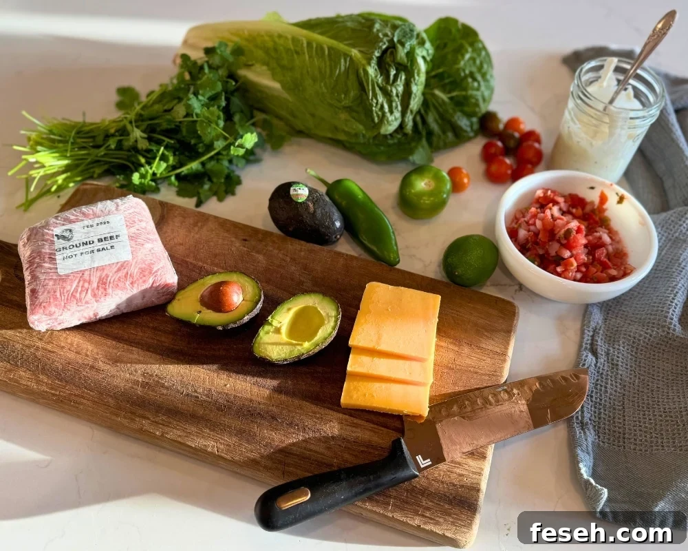loaded taco salad ingredients minus the black beans, and tortilla chips