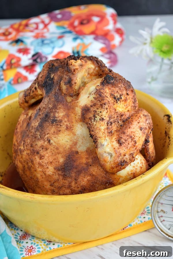 beer can chicken in a yellow roasting can