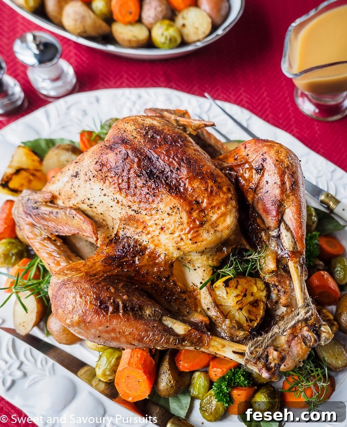 Roasted turkey on platter.