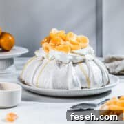 Mandarin Gingerbread pavlova on a serving plate.