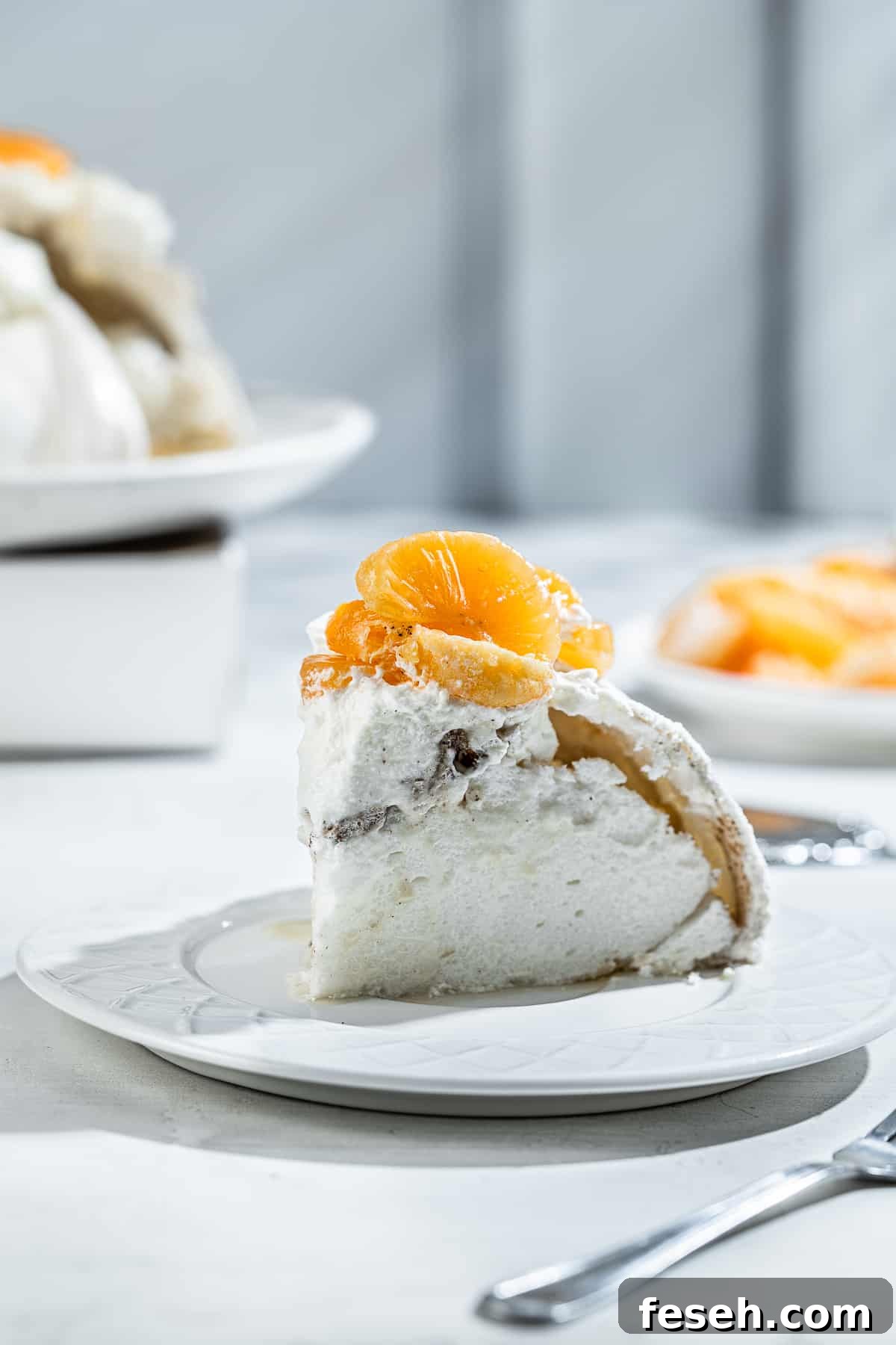 A single slice of Gingerbread Pavlova on a dessert plate.