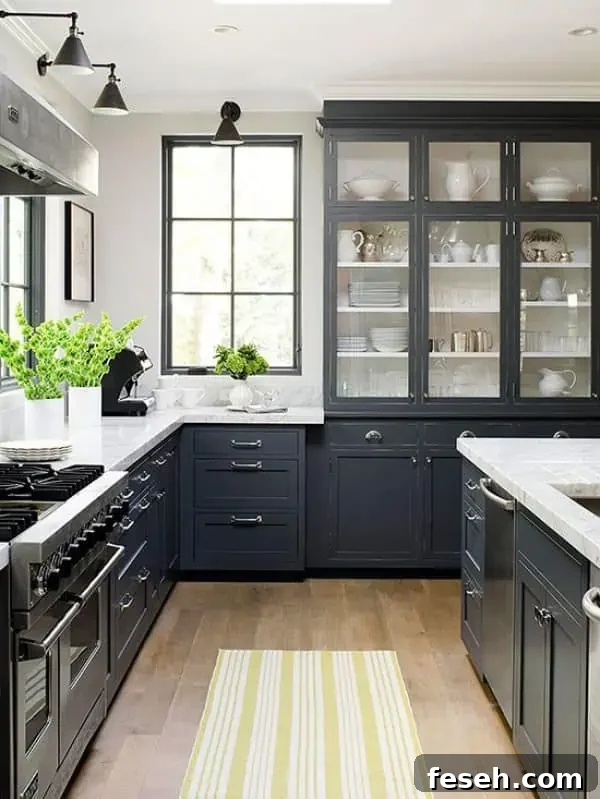 a black and white kitchen with black windows