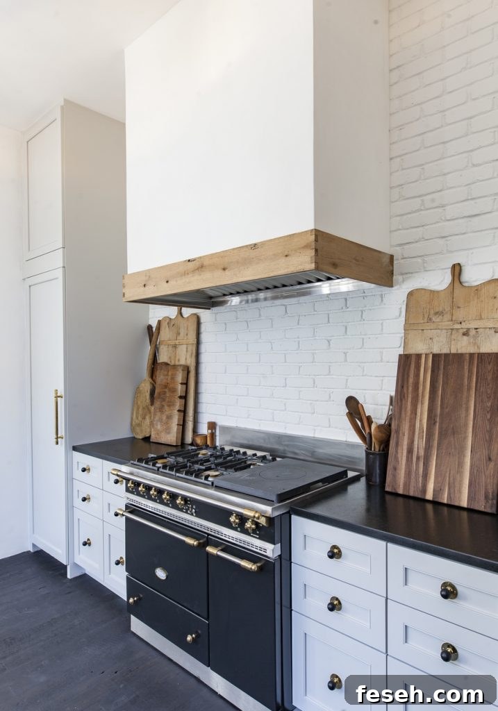 a black range with black countertops