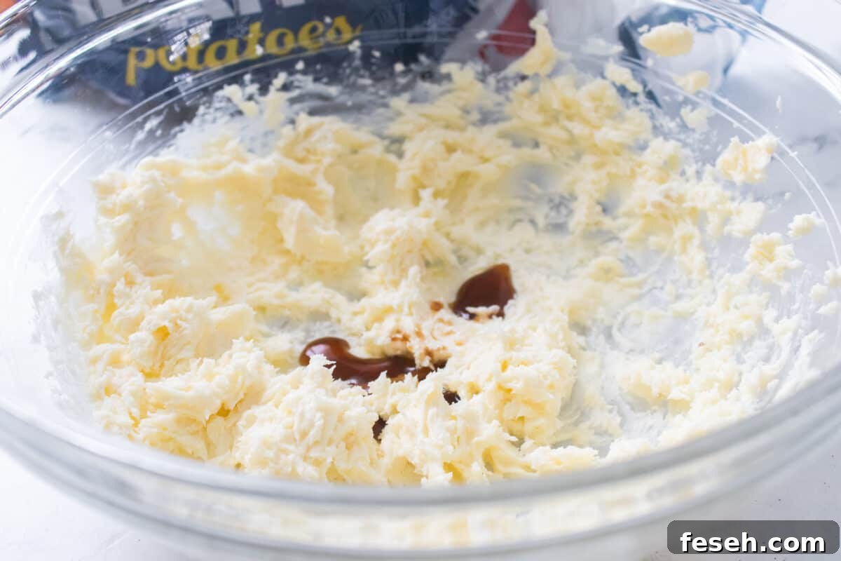 bowl of mashed potatoes that have been blended with softened butter and vanilla extract