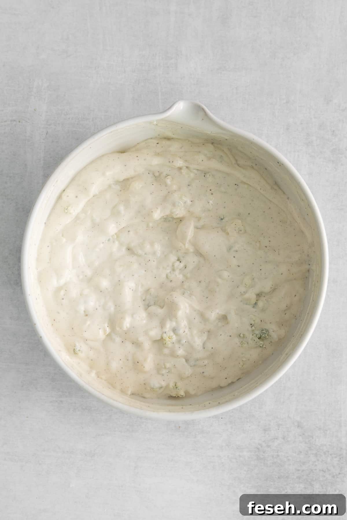 Homemade gorgonzola dressing in a bowl.