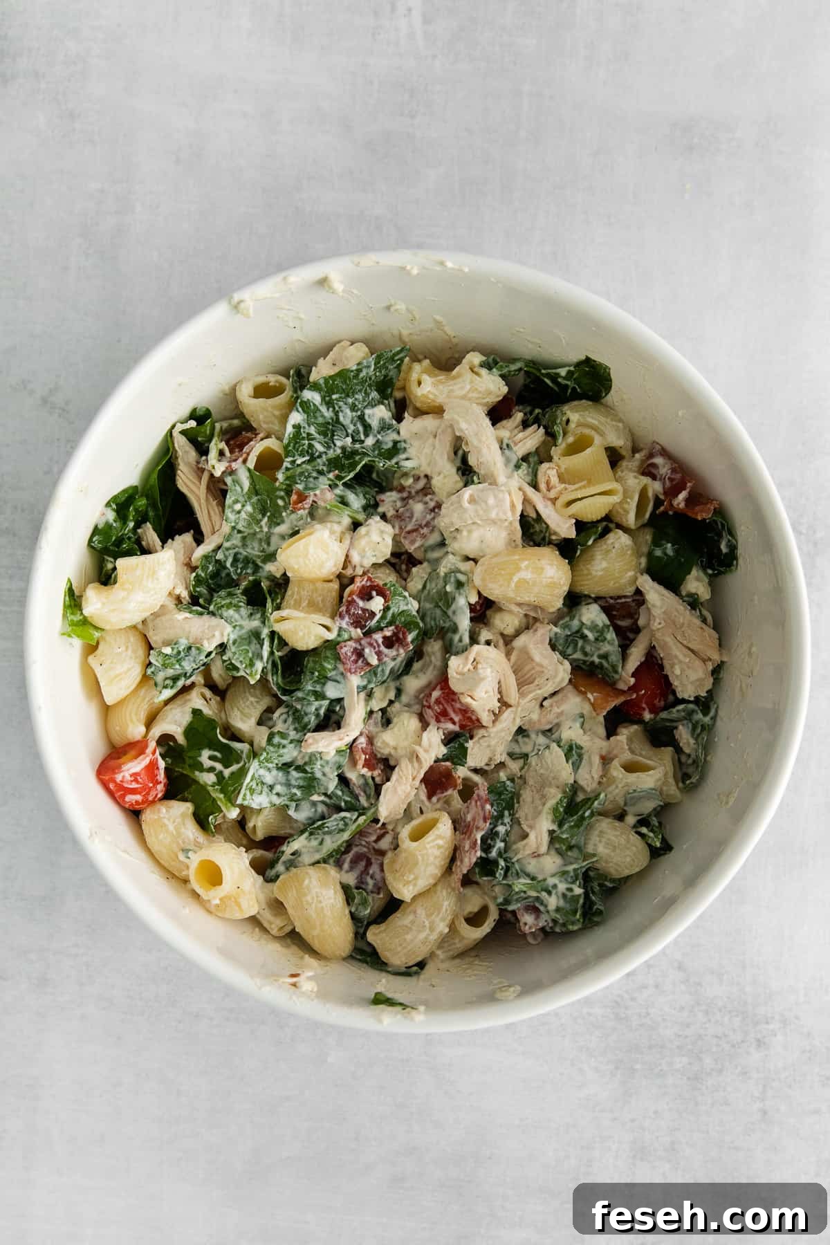 Gorgonzola chicken pasta salad in a bowl.