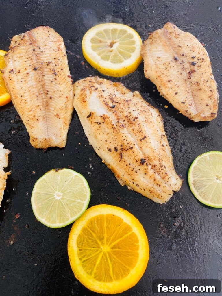 adding slices of citrus to the griddle