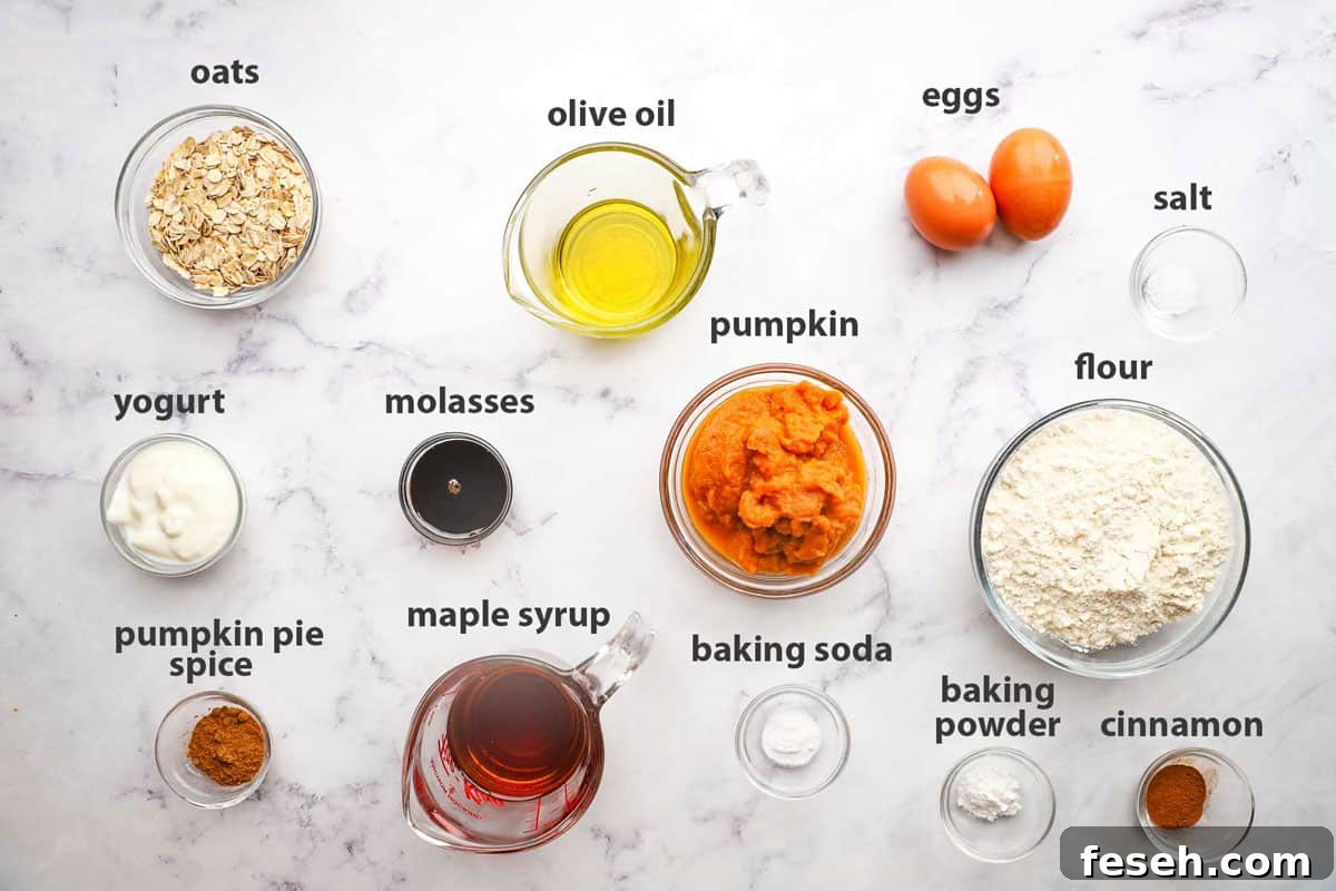 ingredients pictured and labelled for pumpkin oatmeal muffins