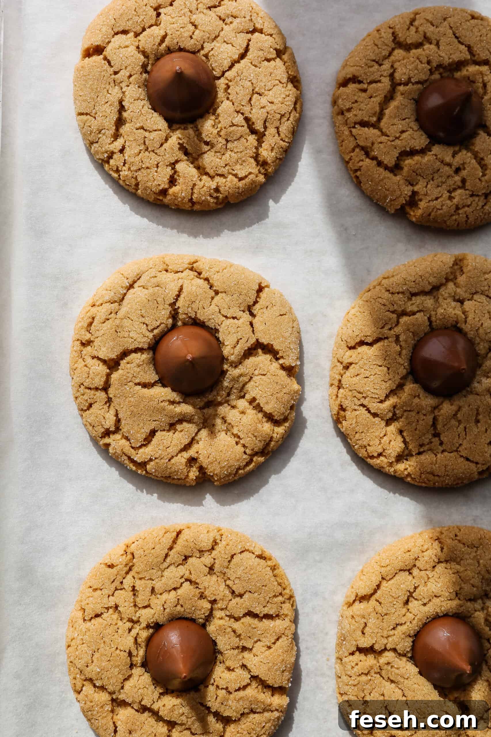 a baking sheet of gluten free peanut butter kiss cookies.