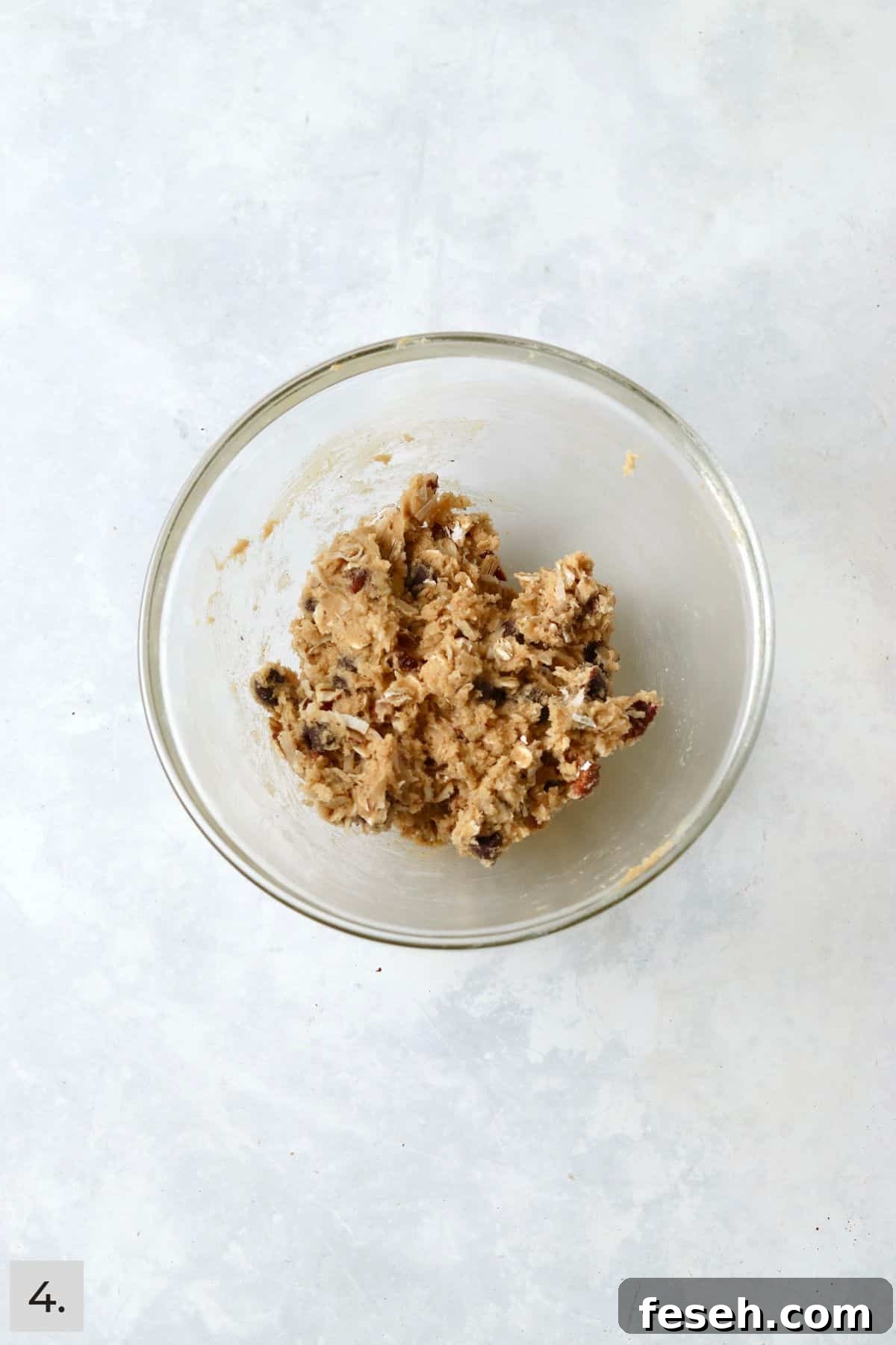Small batch of cowboy cookie in a mixing bowl.