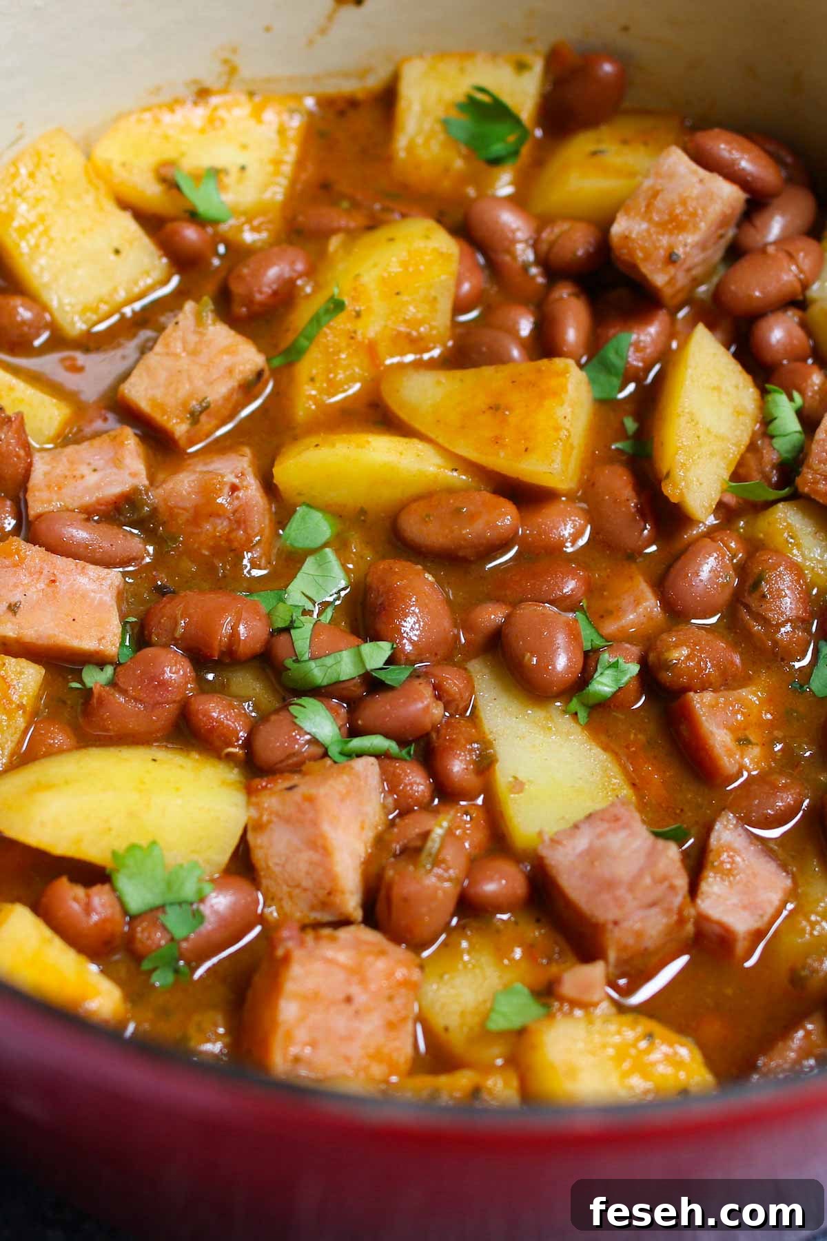 Puerto Rican Rice and Beans are saucy, flavorful, and comforting. Delicious Goya red beans are simmered in sofrito, tomato and sazon sauce! This Puerto Rican staple is also known as Habichuelas or stewed beans, and leftovers are perfect for meal prep.