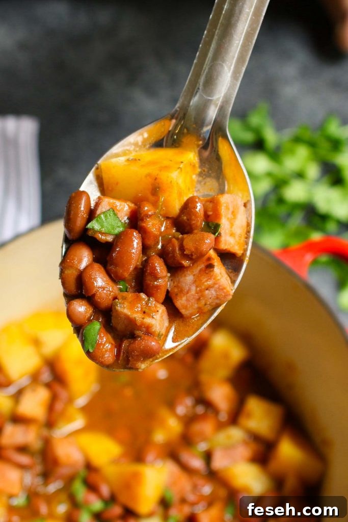 Puerto Rican Rice and Beans are saucy, flavorful, and comforting. Delicious Goya red beans are simmered in sofrito, tomato and sazon sauce! This Puerto Rican staple is also known as Habichuelas or stewed beans, and leftovers are perfect for meal prep.