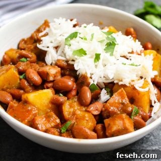 Puerto Rican Rice and Beans are saucy, flavorful, and comforting. Delicious Goya pink beans are simmered in sofrito and tomato sauce with sazon seasoning! This Puerto Rican staple is also known as Habichuelas or stewed beans, and leftovers are perfect for meal prep.