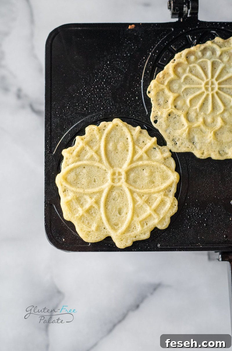 gluten-free pizzelle on a pizzelle iron