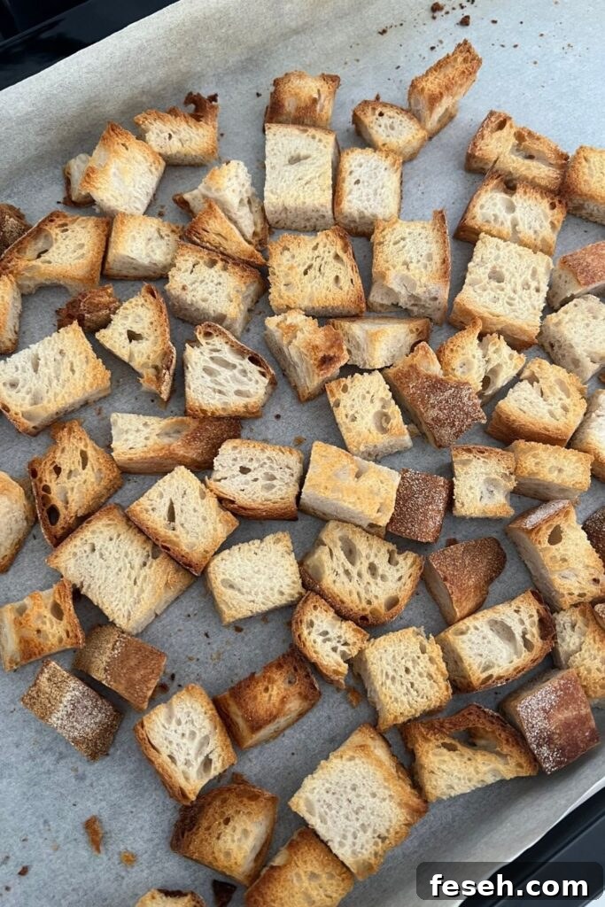 Bread laid out on baking sheet