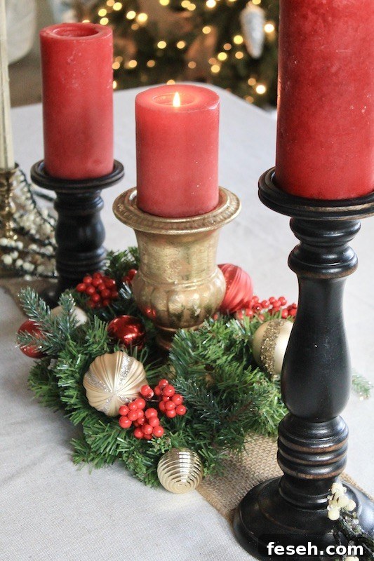 red pillar candle in wreath