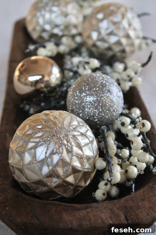 ornaments and winterberry in bowl