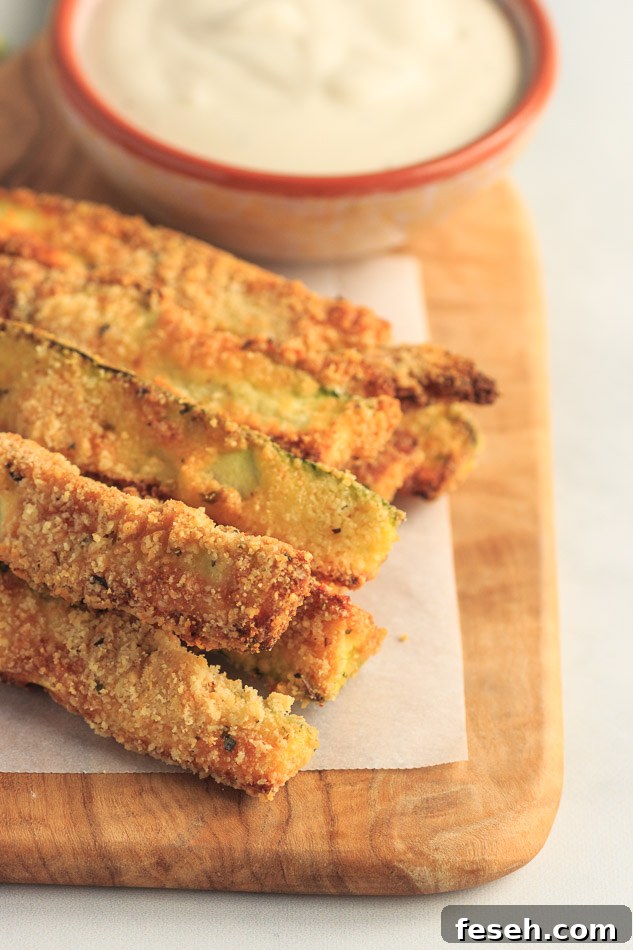 Low Carb Zucchini Fries made in the air fryer or oven.