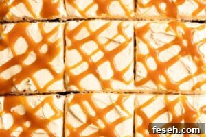 Miso caramel drizzles on top of sliced frosted cake.