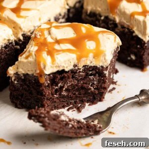 A half eaten slice of chocolate banana cake with miso caramel frosting and drizzle.