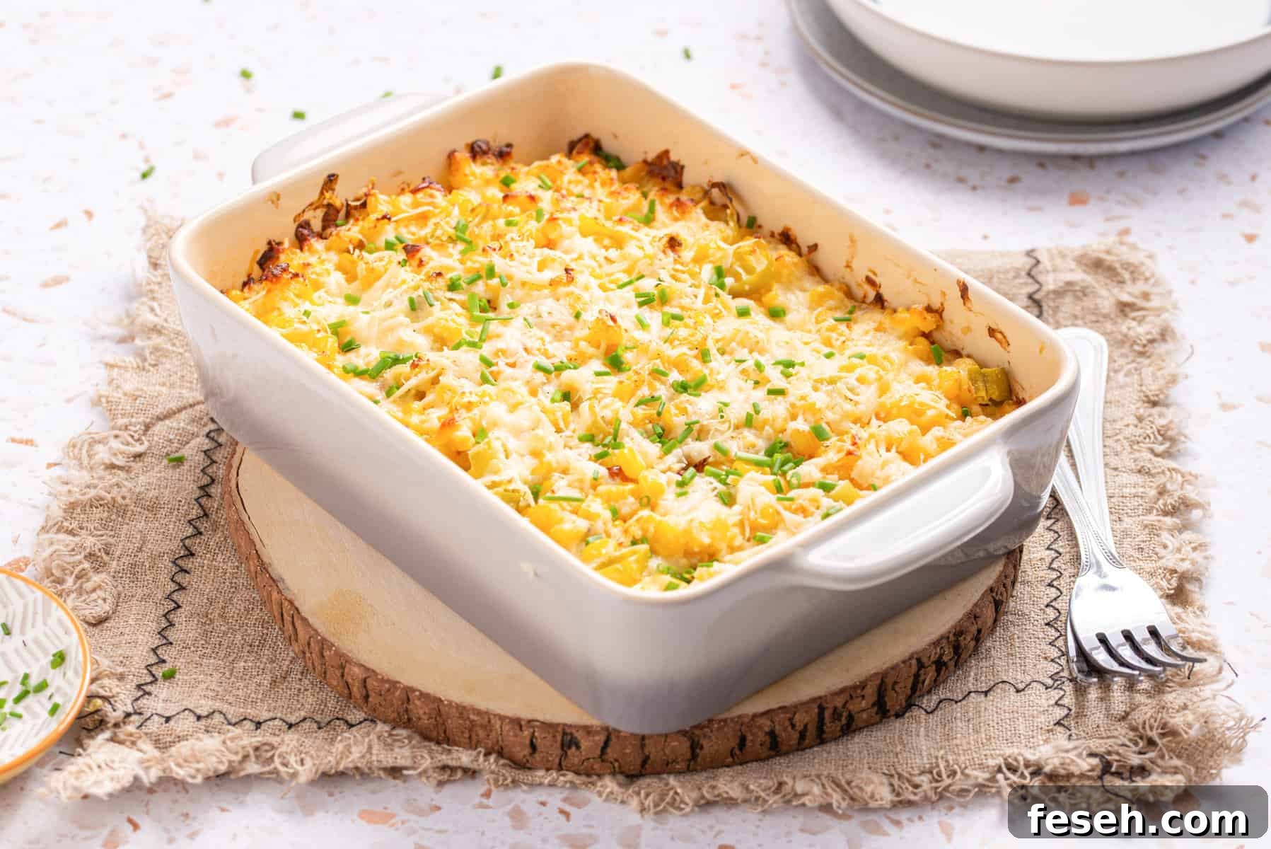 An image of corn casserole with cream cheese, ready to be served