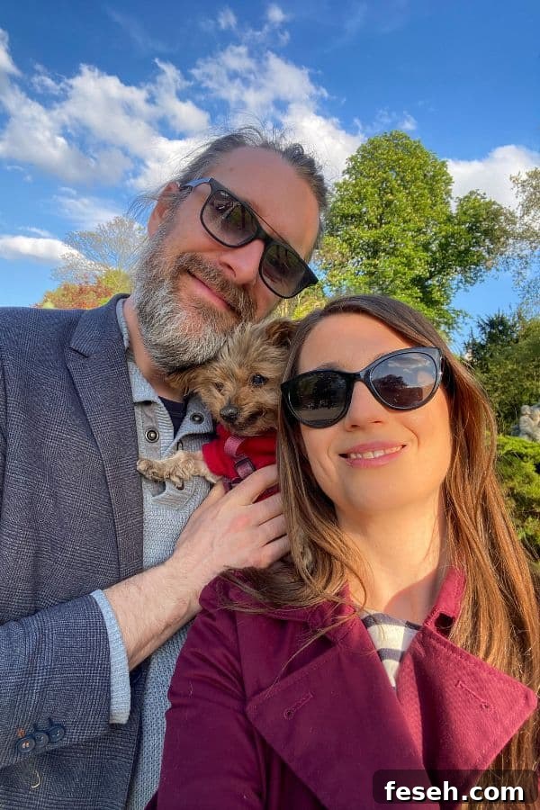man, woman and yorkie in the Ternes Wagram Pereire neighborhood in Paris France