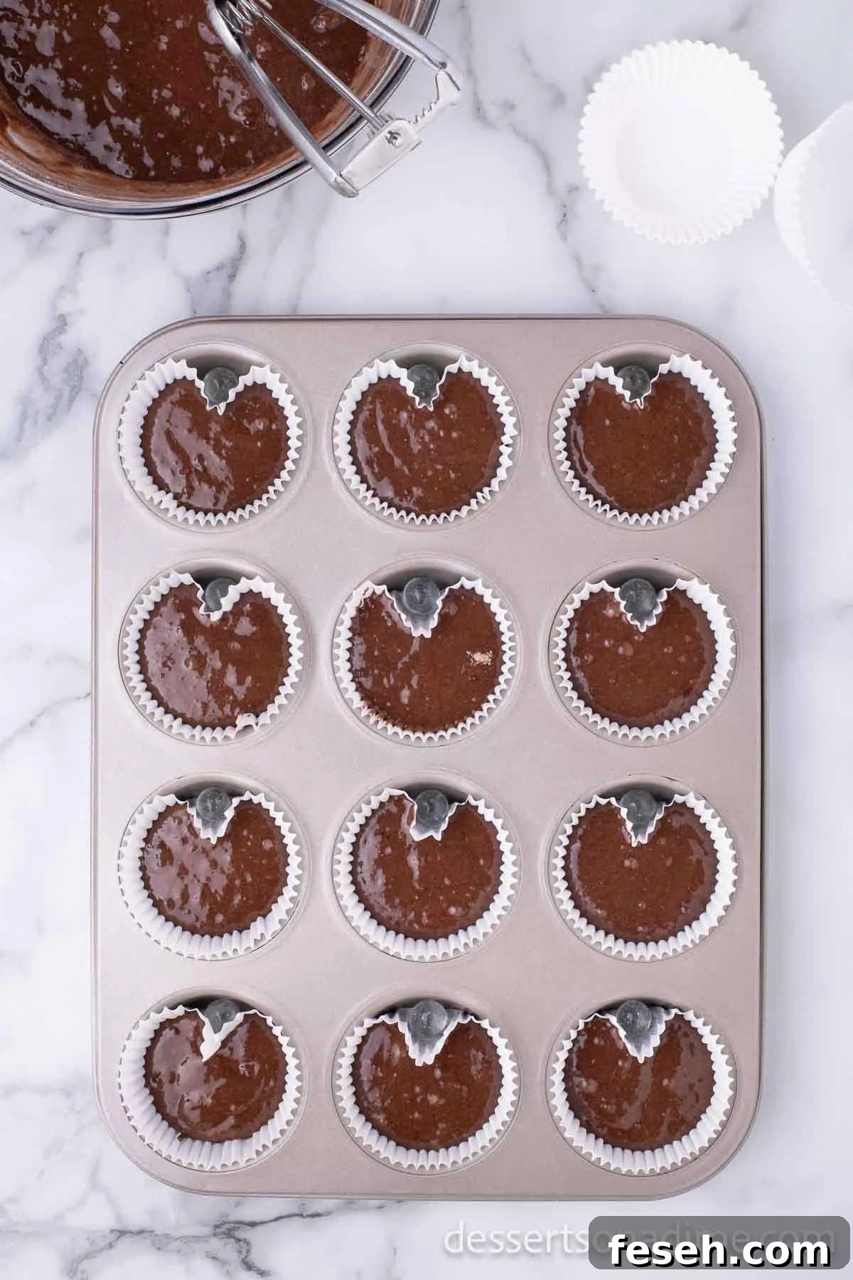 Cupcake batter in liners.