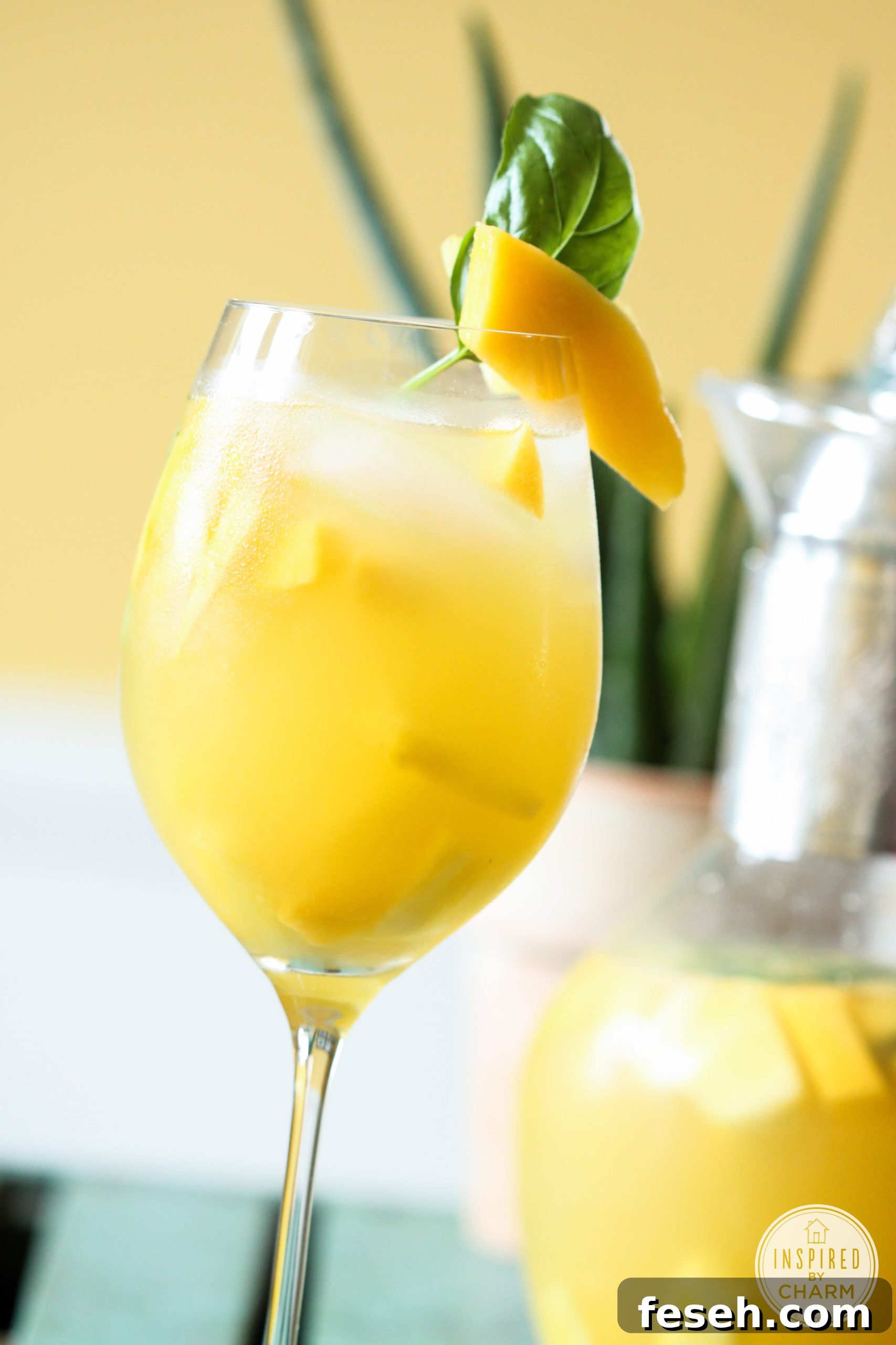 Pineapple, Mango and Basil Sangria #sangria #recipe #cocktail #summer