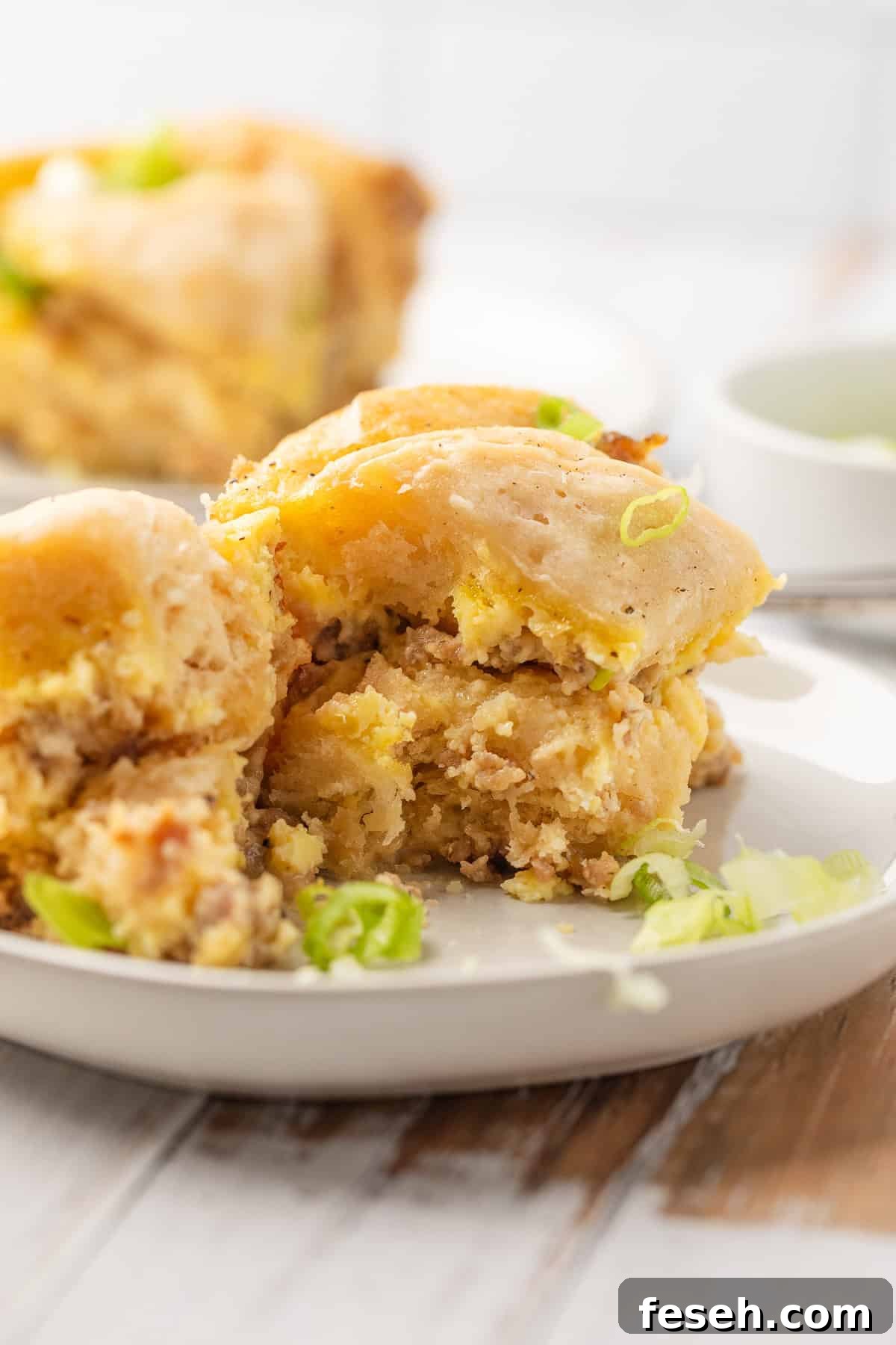 Crockpot biscuits and gravy casserole on a plate.