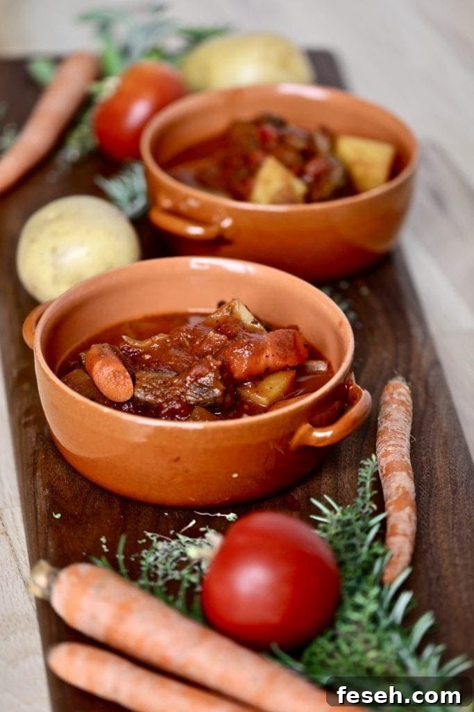 Two orange bowls of Italian spetzzatino.