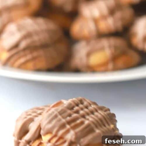 Nilla wafer caramel candies: a quick holiday candy with homemade caramel and milk chocolate drizzle.