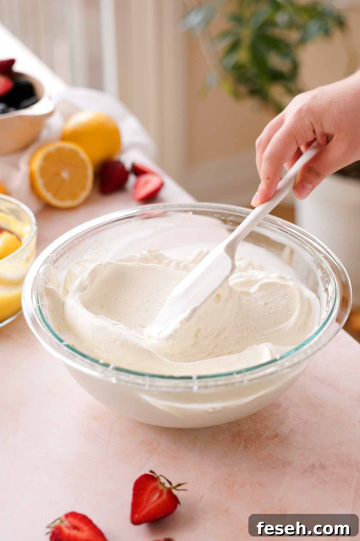whipped cream in glass bowl