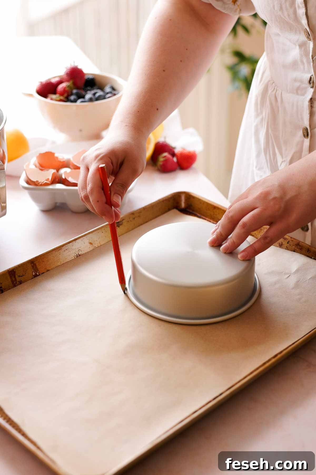 tracing circles onto parchment paper with pencil