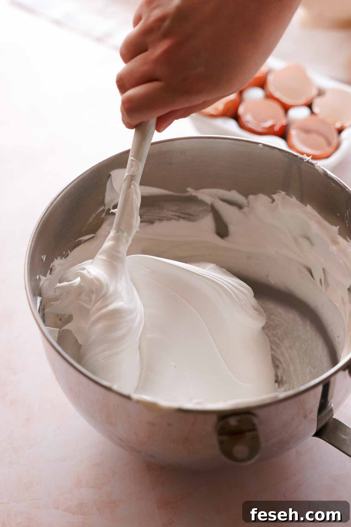 folding cornstarch into whipped egg whites in stand mixer