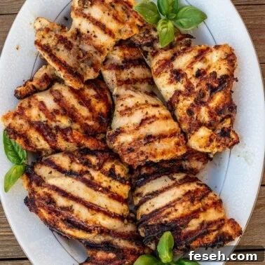 grilled boneless chicken thighs on a platter
